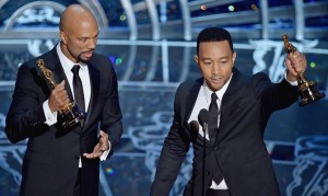 Common and John Legend accepting their Oscar for "Selma."
